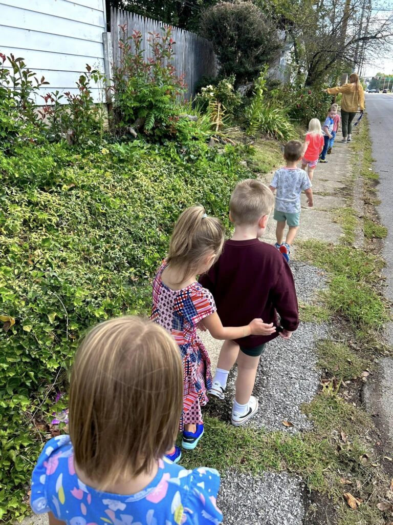 Photo of preschool kids lining up outside for field trip